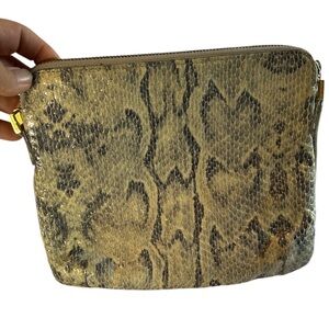 Abas snakeskin leather clutch with zipper and tassel